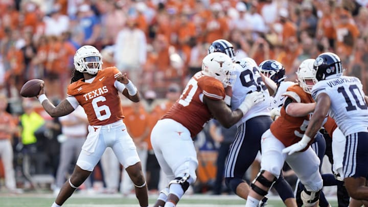 Texas Longhorns quarterback Maalik Murphy throws a touchdown pass to wide receiver Adonai Mitchell