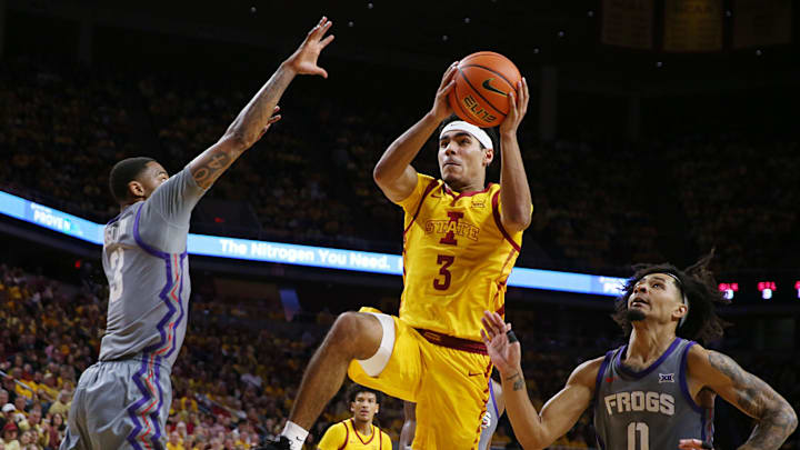 Iowa State Cyclones guard Tamin Lipsey (3) drives to the basket between TCU Horned Frogs guard Avery