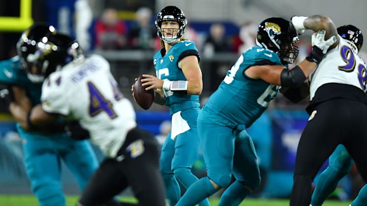 Jacksonville Jaguars quarterback Trevor Lawrence (16) looks for a target during early second quarter