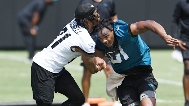 Jacksonville Jaguars cornerback Christian Braswell (21) goes up against cornerback Tyson Campbell (32) at drills during the organized team activity session Monday, June 3, 2024 at EverBank Stadium's Miller Electric Center in Jacksonville, Fla.