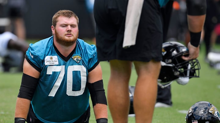 Jacksonville Jaguars offensive tackle Cole Van Lanen (70) stretches during warmups at day two of the Jacksonville Jaguars three day rookie minicamp at TIAA Bank Field in Jacksonville, FL Tuesday, June 13, 2023.