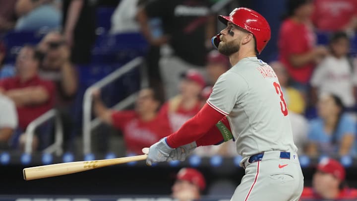 Sep 6, 2025; Miami, Florida, USA; Philadelphia Phillies first baseman Bryce Harper (3) hits a two-run home run in the first inning against the Miami Marlins at loanDepot Park. Sep 6, 2025; Miami, Florida, USA; Philadelphia Phillies first baseman Bryce Harper (3) hits a two-run home run in the first inning against the Miami Marlins at loanDepot Park.