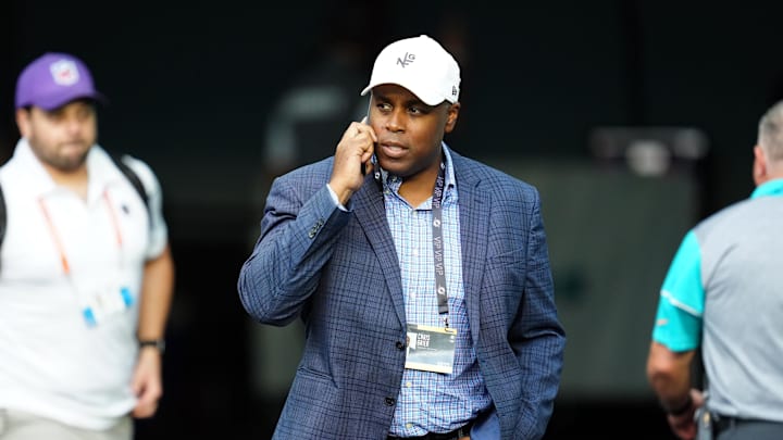 Aug 20, 2022; Miami Gardens, Florida, USA; Miami Dolphins general manager Chris Grier walks on the