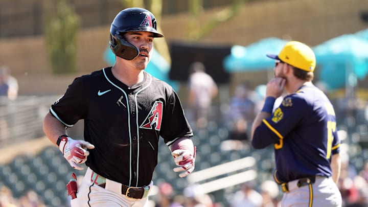 Arizona Diamondbacks' Corbin Carroll rounds the bases after hitting a grand slam home run off Milwaukee Brewers pitcher Josh Maciejewski in the second inning of a spring training game on Feb. 26, 2025, in Scottsdale at Salt River Fields at Talking Stick.