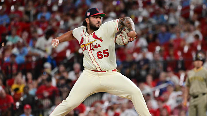 Jul 26, 2025; St. Louis, Missouri, USA;  St. Louis Cardinals pitcher Andre Granillo (65) pitches in relief against the San Diego Padres in the ninth inning at Busch Stadium. Mandatory Credit: Tim Vizer-Imagn Images