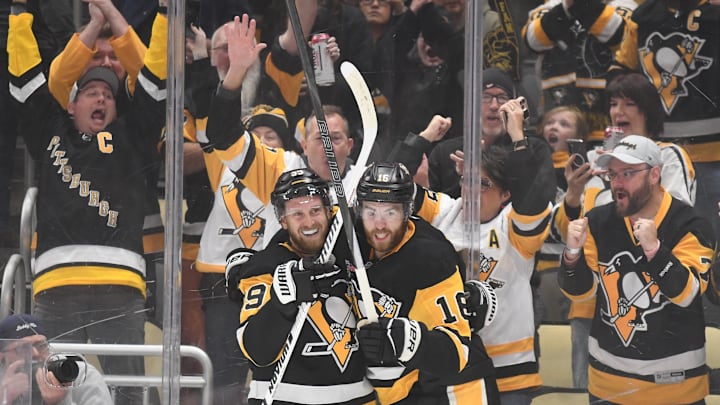 Oct 25, 2025; Pittsburgh, Pennsylvania, USA; Pittsburgh Penguins right wing Anthony Mantha (39) celebrates his goal with right wing Justin Brazeau (16) against the Columbus Blue Jackets during first period action at PPG Paints Arena. Mandatory Credit: Philip G. Pavely-Imagn Images