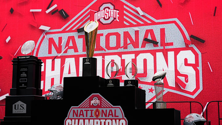 The championship trophies sit on the stage during the Ohio State Buckeyes College Football Playoff National Championship celebration at Ohio Stadium in Columbus on Jan. 26, 2025.