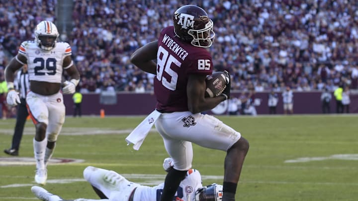 Texas A&M Aggies tight end Jalen Wydermyer (85) breaks the tackle of Auburn Tigers cornerback Roger McCreary (23) in the fourth quarter at Kyle Field. Texas A&M Aggies won 20 to 3.