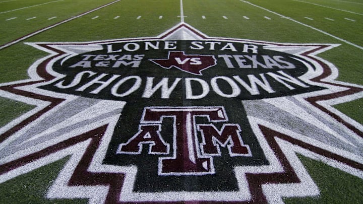 General view of the lone star showdown logo on the field before a game between the Texas A&M Aggies and Texas Longhorns at Kyle Field. General view of the lone star showdown logo on the field before a game between the Texas A&M Aggies and Texas Longhorns at Kyle Field.