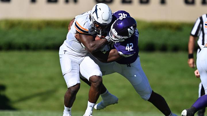 University of Texas El Paso Miners running back Deion Hankins (3) is tackled by Northwestern Wildcats defensive lineman Anto Saka (42) in the first half at Ryan Field.