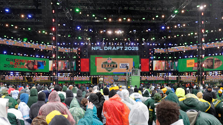 Fans gather near the Draft Theater during the second day of the NFL Draft presented by Bud Light at Friday, April 25, 2025, outside of Lambeau Field in Green Bay, Wisconsin