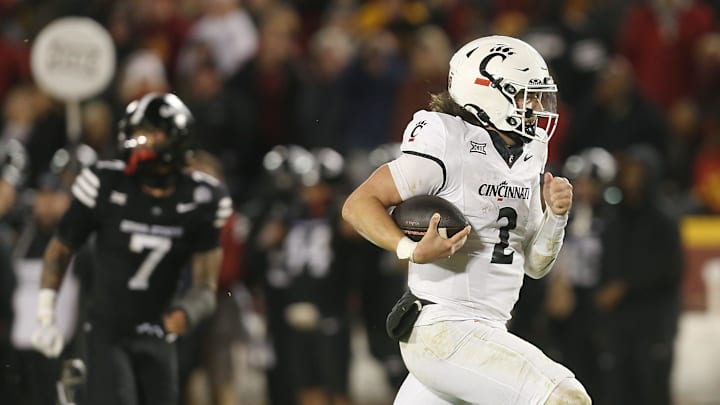 Cincinnati Bearcats' quarterback Brendan Sorsby (2) runs for a touchdown against Iowa State during the fourth quarter in the week-12 NCAA football at Jack Trice Stadium on Saturday, Nov. 16, 2024, in Ames, Iowa.