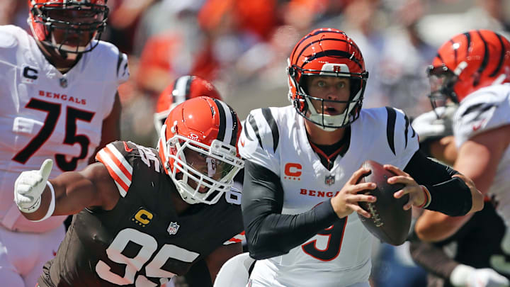 Cleveland Browns defensive end Myles Garrett (95) chases down Cincinnati Bengals quarterback Joe Burrow (9) during the first half of an NFL football game at Huntington Bank Field, Sept. 7, 2025, in Cleveland, Ohio.