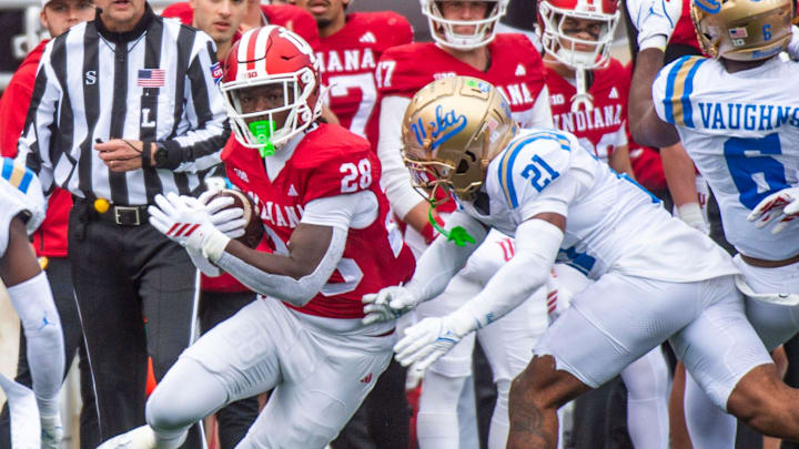 Indiana's Khobe Martin (28) runs during the Indiana versus UCLA football game at Memorial Stadium on Saturday, Oct. 25, 2025. Indiana's Khobe Martin (28) runs during the Indiana versus UCLA football game at Memorial Stadium on Saturday, Oct. 25, 2025.