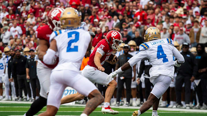 Indiana's Fernando Mendoza (15) runs during the Indiana versus UCLA football game at Memorial Stadium on Saturday, Oct. 25, 2025.