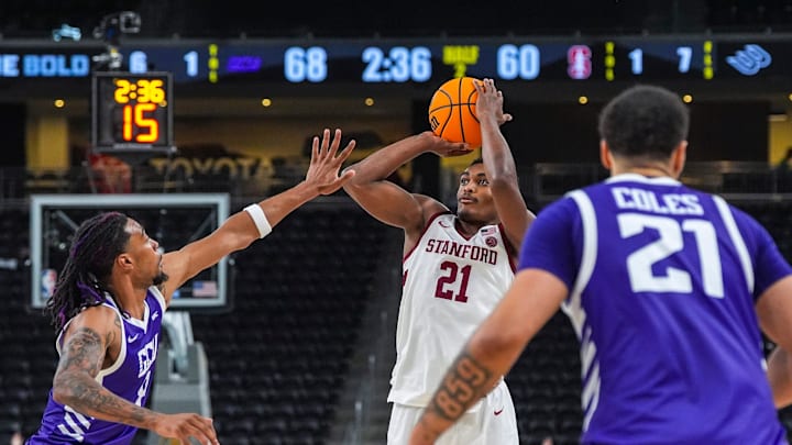 Stanford guard Jaylen Blakes (21) takes a shot during the second half of their game in the Acrisure Series in Palm Desert, Calif., Tuesday, Nov. 26, 2024. Stanford guard Jaylen Blakes (21) takes a shot during the second half of their game in the Acrisure Series in Palm Desert, Calif., Tuesday, Nov. 26, 2024.