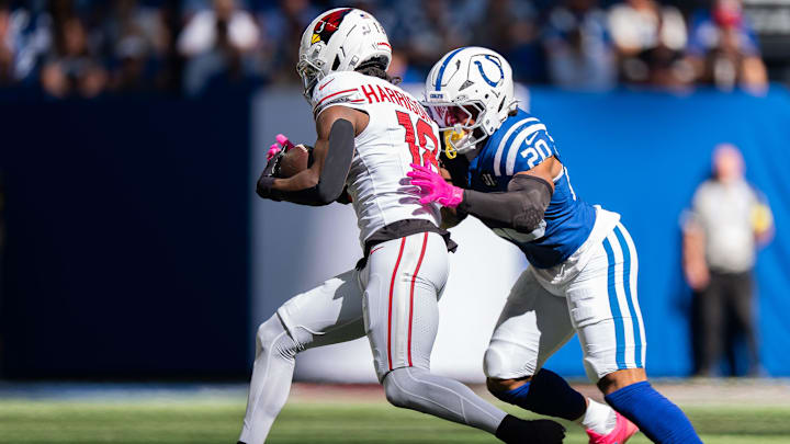 Indianapolis Colts safety Nick Cross (20) drives Arizona Cardinals wide receiver Marvin Harrison Jr. (18) out of bounds Sunday, Oct. 12, 2025, at Lucas Oil Stadium in Indianapolis.