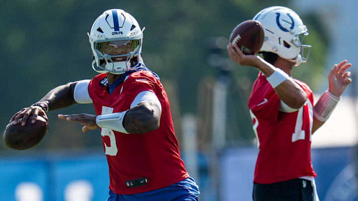 Indianapolis Colts quarterbacks Anthony Richardson Sr. (5) and Daniel Jones (17) pass Wednesday, July 23, 2025, during the first day of training camp held at Grand Park in Westfield. Indianapolis Colts quarterbacks Anthony Richardson Sr. (5) and Daniel Jones (17) pass Wednesday, July 23, 2025, during the first day of training camp held at Grand Park in Westfield.