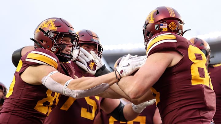 Nov 23, 2024; Minneapolis, Minnesota, USA; Minnesota Golden Gophers tight end Jameson Geers (86) celebrates his touchdown against the Penn State Nittany Lions during the second quarter at Huntington Bank Stadium. Mandatory Credit: Matt Krohn-Imagn Images Nov 23, 2024; Minneapolis, Minnesota, USA; Minnesota Golden Gophers tight end Jameson Geers (86) celebrates his touchdown against the Penn State Nittany Lions during the second quarter at Huntington Bank Stadium. Mandatory Credit: Matt Krohn-Imagn Images