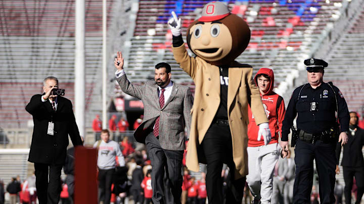 Nov 18, 2023; Columbus, Ohio, USA; Ohio State Buckeyes head coach Ryan Day walks into Ohio Stadium behind Brutus Buckeye prior to the NCAA football game against the Minnesota Golden Gophers.