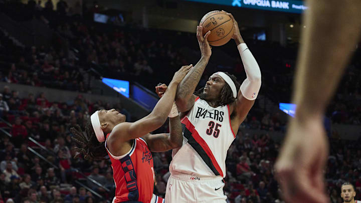 Jan 16, 2025; Portland, Oregon, USA; Portland Trail Blazers center Robert Williams III (35) grabs a rebound during the second half against LA Clippers guard Terance Mann (14) at Moda Center. Mandatory Credit: Troy Wayrynen-Imagn Images Jan 16, 2025; Portland, Oregon, USA; Portland Trail Blazers center Robert Williams III (35) grabs a rebound during the second half against LA Clippers guard Terance Mann (14) at Moda Center. Mandatory Credit: Troy Wayrynen-Imagn Images