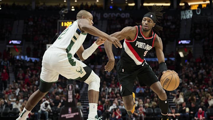 Jan 31, 2024; Portland, Oregon, USA; Portland Trail Blazers forward Jerami Grant (9) drives to the basket during the second half against Milwaukee Bucks forward Khris Middleton (22) at Moda Center. Mandatory Credit: Troy Wayrynen-Imagn Images Jan 31, 2024; Portland, Oregon, USA; Portland Trail Blazers forward Jerami Grant (9) drives to the basket during the second half against Milwaukee Bucks forward Khris Middleton (22) at Moda Center. Mandatory Credit: Troy Wayrynen-Imagn Images