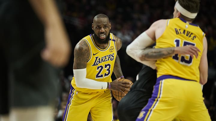 Feb 20, 2025; Portland, Oregon, USA; Los Angeles Lakers forward LeBron James (23) looks to pass the ball during the second half against the Portland Trail Blazers at Moda Center. Mandatory Credit: Troy Wayrynen-Imagn Images