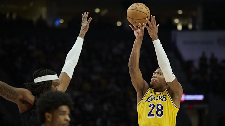 Feb 20, 2025; Portland, Oregon, USA; Los Angeles Lakers forward Rui Hachimura (28) shoots a jump shot during the second half against Portland Trail Blazers center Robert Williams III (35) at Moda Center. Mandatory Credit: Troy Wayrynen-Imagn Images