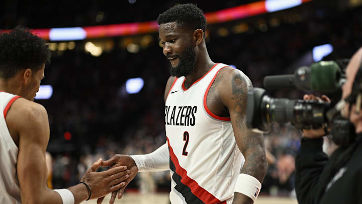 Mar 13, 2024; Portland, Oregon, USA; Portland Trail Blazers center Deandre Ayton (2) high-fives forward Toumani Camara (33) after a game against the Atlanta Hawks at Moda Center. Mandatory Credit: Troy Wayrynen-Imagn Images Mar 13, 2024; Portland, Oregon, USA; Portland Trail Blazers center Deandre Ayton (2) high-fives forward Toumani Camara (33) after a game against the Atlanta Hawks at Moda Center. Mandatory Credit: Troy Wayrynen-Imagn Images