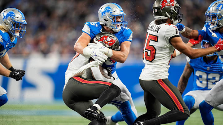 Detroit Lions linebacker Jack Campbell (46) tackles Tampa Bay Buccaneers running back Bucky Irving (7) during the first half at Ford Field in Detroit on Sunday, September 15, 2024.