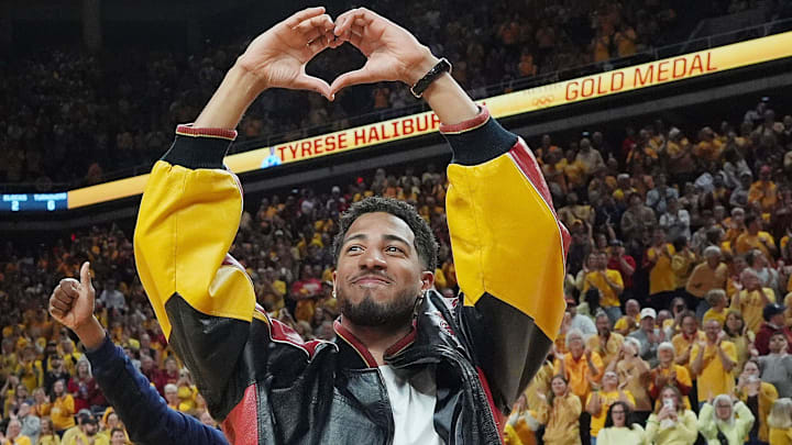Former Iowa State and Indiana Packer guard Tyrese Haliburton shows heart sign as the unveiling his Olympic 24 gold made banner during the halftime of Cyclones and Wildcats men’s basketball showdown at Hilton Coliseum on Saturday March 1, 2025 in Ames, Iowa.