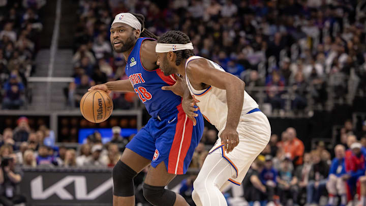 Apr 10, 2025; Detroit, Michigan, USA; New York Knicks forward Precious Achiuwa (5) defends against Detroit Pistons center Isaiah Stewart (28) during the second half at Little Caesars Arena. Mandatory Credit: David Reginek-Imagn Images Apr 10, 2025; Detroit, Michigan, USA; New York Knicks forward Precious Achiuwa (5) defends against Detroit Pistons center Isaiah Stewart (28) during the second half at Little Caesars Arena. Mandatory Credit: David Reginek-Imagn Images