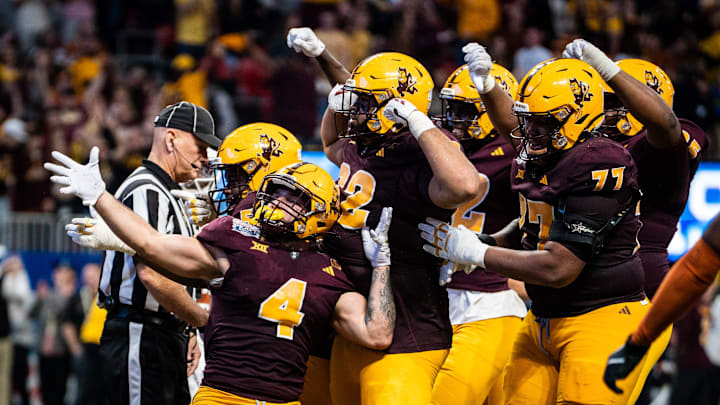 Arizona State celebrate together after Arizona State Sun Devils running back Cam Skattebo (4) scores a touchdown in the fourth quarter as the Texas Longhorns play the Arizona State Sun Devils in the Peach Bowl College Football Playoff quarterfinal at Mercedes-Benz Stadium in Atlanta, Georgia, Jan. 1, 2025.