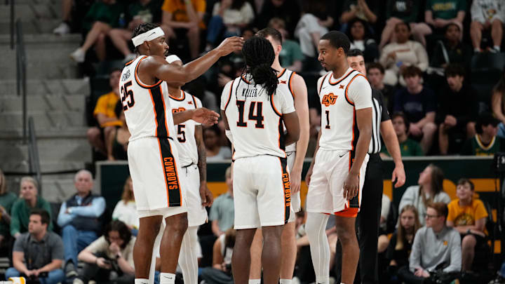 Mar 1, 2025; Waco, Texas, USA; The Oklahoma State Cowboys huddle during a break in play against the Baylor Bears during the first half at Paul and Alejandra Foster Pavilion. Mandatory Credit: Chris Jones-Imagn Images Mar 1, 2025; Waco, Texas, USA; The Oklahoma State Cowboys huddle during a break in play against the Baylor Bears during the first half at Paul and Alejandra Foster Pavilion. Mandatory Credit: Chris Jones-Imagn Images