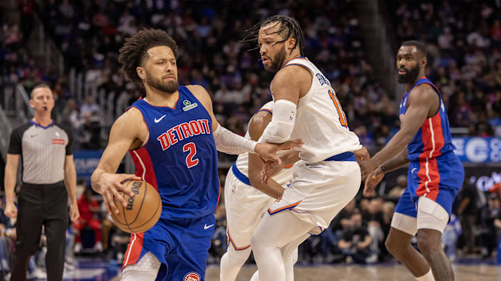 Apr 10, 2025; Detroit, Michigan, USA; New York Knicks guard Jalen Brunson (11) defends against Detroit Pistons guard Cade Cunningham (2) during the second half at Little Caesars Arena. Mandatory Credit: David Reginek-Imagn Images
