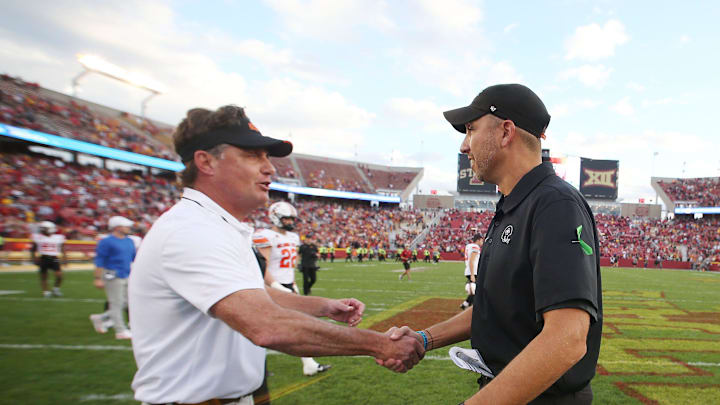 Iowa State Cyclones' head coach Matt Campbell gets congratulation from Oklahoma State Cowboys' football head coach Mike Gundy after winning 34-27 in an NCAA college football game at Jack Trice Stadium on Saturday, Sept. 23, 2023, in Ames, Iowa. Iowa State Cyclones' head coach Matt Campbell gets congratulation from Oklahoma State Cowboys' football head coach Mike Gundy after winning 34-27 in an NCAA college football game at Jack Trice Stadium on Saturday, Sept. 23, 2023, in Ames, Iowa.