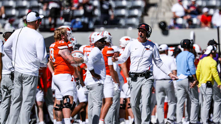 Oct 4, 2025; Tucson, Arizona, USA; Oklahoma State Cowboys interim head coach Doug Meacham walks on the sideline against the Arizona Wildcats during the second quarter at Arizona Stadium. Mandatory Credit: Aryanna Frank-Imagn Images Oct 4, 2025; Tucson, Arizona, USA; Oklahoma State Cowboys interim head coach Doug Meacham walks on the sideline against the Arizona Wildcats during the second quarter at Arizona Stadium. Mandatory Credit: Aryanna Frank-Imagn Images