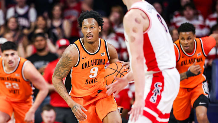 Feb 7, 2026; Tucson, Arizona, USA; Oklahoma State Cowboys guard Anthony Roy (9) dribbles the ball down the court during the first half of the game against the Arizona Wildcats at McKale Memorial Center. Mandatory Credit: Aryanna Frank-Imagn Images