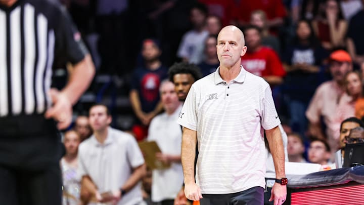 Feb 7, 2026; Tucson, Arizona, USA; Oklahoma State Cowboys head coach Steve Lutz watches from the sidelines during the first half of the game against the Arizona Wildcats at McKale Memorial Center. Mandatory Credit: Aryanna Frank-Imagn Images Feb 7, 2026; Tucson, Arizona, USA; Oklahoma State Cowboys head coach Steve Lutz watches from the sidelines during the first half of the game against the Arizona Wildcats at McKale Memorial Center. Mandatory Credit: Aryanna Frank-Imagn Images