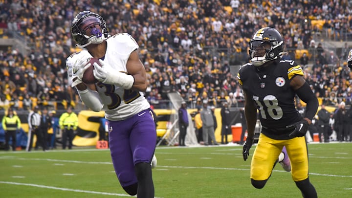 Dec 11, 2022; Pittsburgh, Pennsylvania, USA;  Baltimore Ravens defensive back Marcus Williams (32) intercepts a pass intended for Pittsburgh Steelers wide receiver Diontae Johnson (18) during the third quarter at Acrisure Stadium. The Ravens won 16-14. Mandatory Credit: Philip G. Pavely-Imagn Images