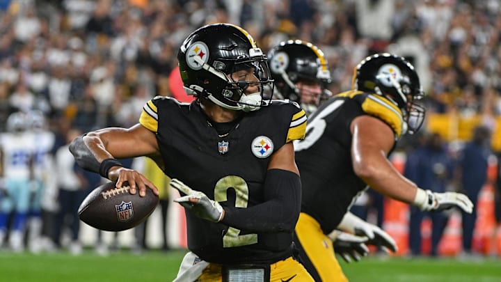 Oct 6, 2024; Pittsburgh, Pennsylvania, USA; Pittsburgh Steelers quarterback Justin Fields (2) throws a pass against the Dallas Cowboys during the first quarter at Acrisure Stadium. Mandatory Credit: Barry Reeger-Imagn Images