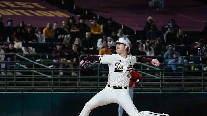 Starting pitcher, Ben Jacobs (22) of the Arizona State Sun Devils throws at the home opener against Ohio State at Phoenix Municipal Stadium on Feb. 14, 2025, in Phoenix, Ariz. Starting pitcher, Ben Jacobs (22) of the Arizona State Sun Devils throws at the home opener against Ohio State at Phoenix Municipal Stadium on Feb. 14, 2025, in Phoenix, Ariz.