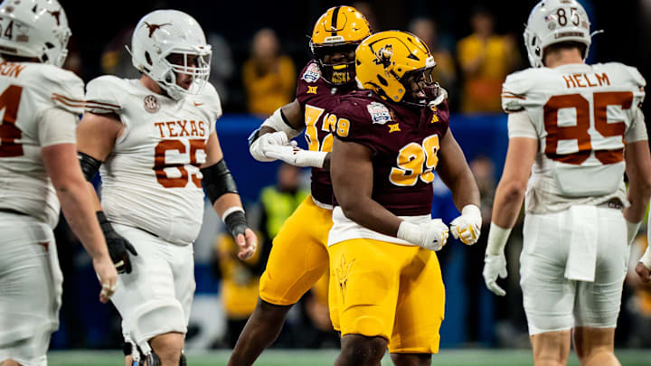 Arizona State defenders celebrates a play in the fourth quarter as the Texas Longhorns play the Arizona State Sun Devils in the Peach Bowl College Football Playoff quarterfinal at Mercedes-Benz Stadium in Atlanta, Georgia, Jan. 1, 2025.