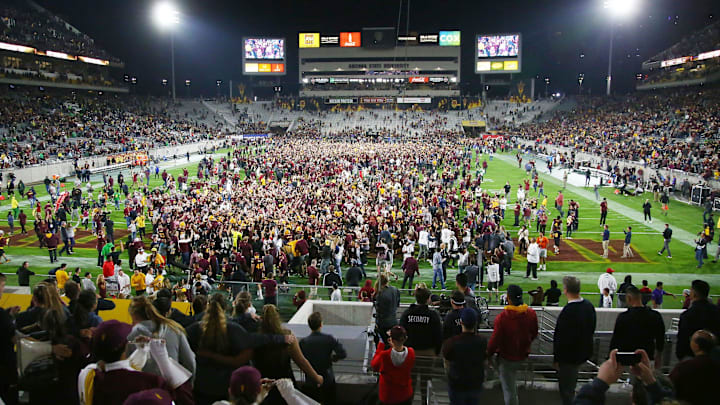 Fans rush the field after Arizona State defeated Oregon on Saturday night at Sun Devil Stadium. ASU became bowl eligible with the victory.

Oregon Ducks Vs Arizona State Sun Devils