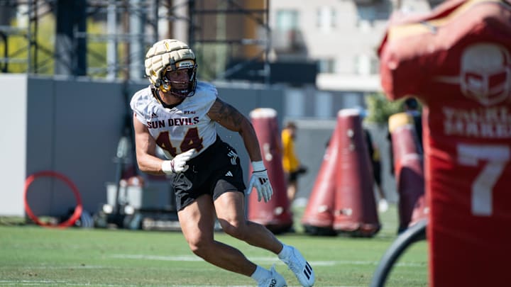 Keyshaun Elliott (44) runs through drills at Sun Devils spring football practice at ASU's Kajikawa practice fields on March 27, 2025, in Tempe, Ariz.