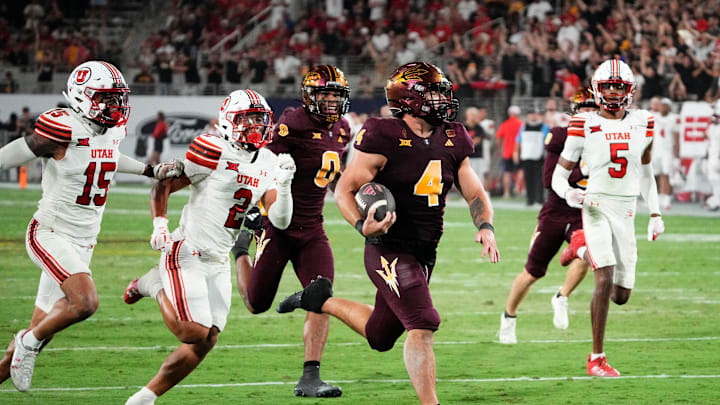 Arizona State Sun Devils running back Cam Skattebo (4) runs for a touchdown against the Utah Utes in the fourth quarter at Mountain America Stadium. Arizona State Sun Devils running back Cam Skattebo (4) runs for a touchdown against the Utah Utes in the fourth quarter at Mountain America Stadium.