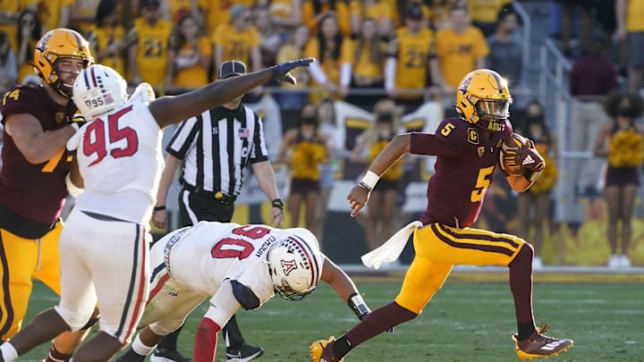 Arizona State Sun Devils quarterback Jayden Daniels (5) runs for a 48-yard touchdown against the Arizona Wildcats during the 95th Territorial Cup game at Sun Devil Stadium in Tempe on Nov. 27, 2021.