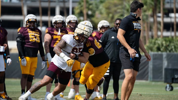 Defensive lineman Justin Wodtly (95) and offensive lineman Xander Ruggeroli (60) run through drills at Sun Devils spring football practice at Kajikawa Practice fields on April 1, 2025, in Tempe, Ariz. Defensive lineman Justin Wodtly (95) and offensive lineman Xander Ruggeroli (60) run through drills at Sun Devils spring football practice at Kajikawa Practice fields on April 1, 2025, in Tempe, Ariz.