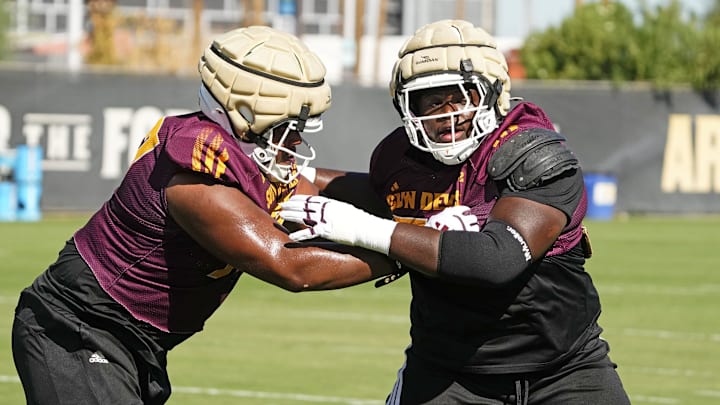 Arizona State Sun Devils offensive lineman Jimeto Obigbo (right) during practice in Tempe on Sept. 10, 2025.