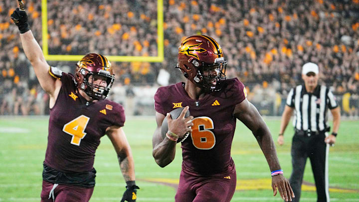 Arizona State Sun Devils quarterback Jeff Sims (6) runs for a touchdown against the Utah Utes in the first half at Mountain America Stadium in Tempe on Oct. 11, 2024.